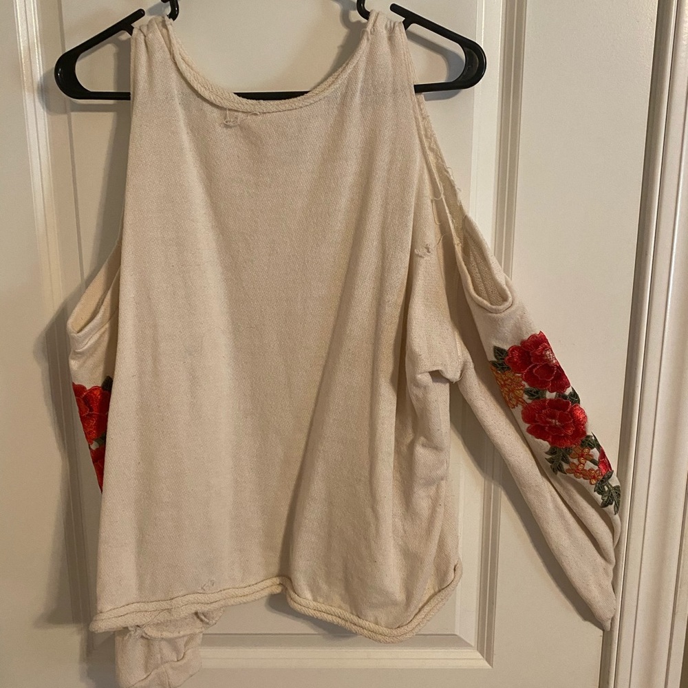 Cream cut out shoulder with flower detail